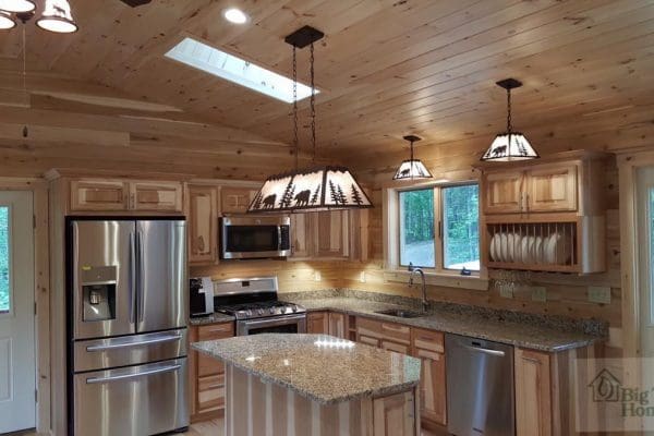 Beautiful lighting in a custom kitchen from Big Twig homes.