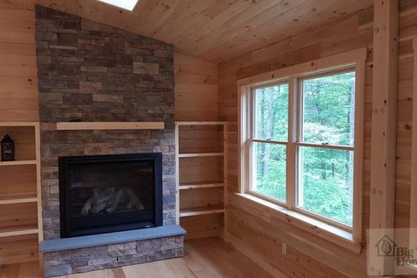 A custom fireplace in a log home.