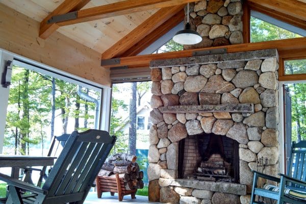 outdoor fireplace in sunroom